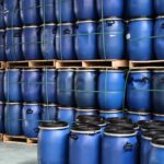 What does the "regeneration" stage of an adsorption dryer refer to?